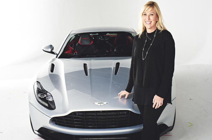 Laura Schwab, president of Aston Martin the Americas, with the DB11. Photo Credit: Aston Martin