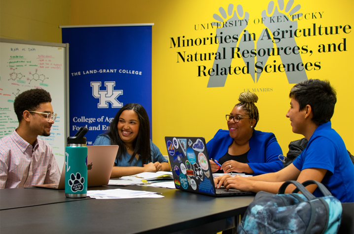 Left to right: Harrison Goode, MANRRS Vice President, Jazmine Faulkner, MANRRS President, Mia Farrell, Associate Dean for Diversity, and Maya Horvath, MANRRS Student Council Rep, in the new community room in N24 Ag North. Photo by Seth Riker