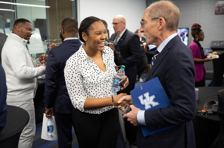 UK President Eli Capilouto greets UK senior Kamaria Campbell at the Martin Luther King Center Opening