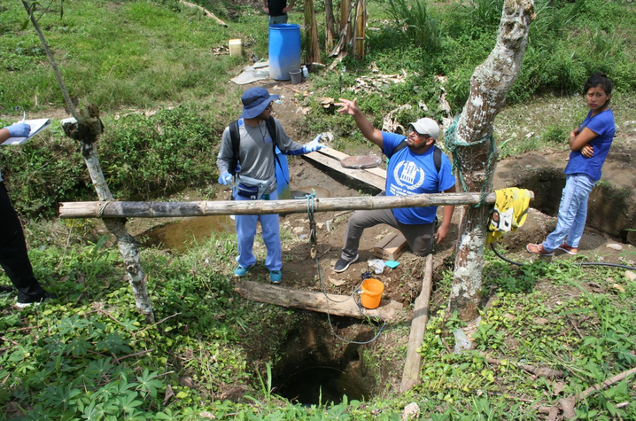 Workers on site with well