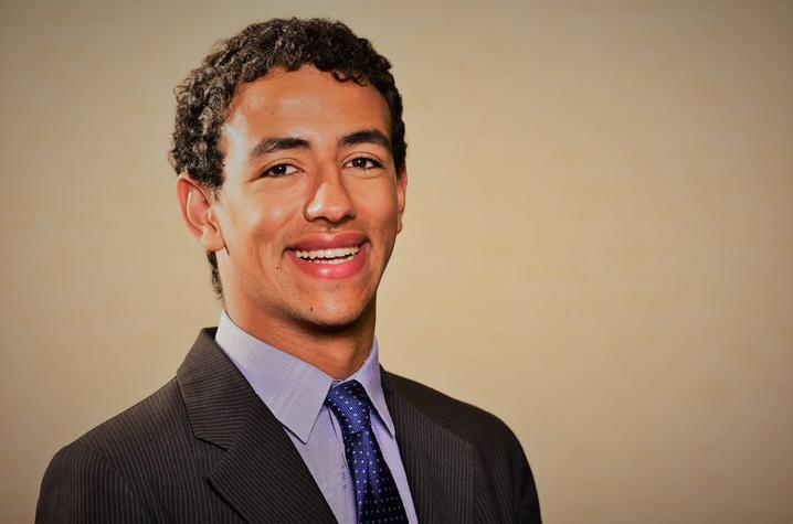 headshot photo of Mohanad Abdallah in suit