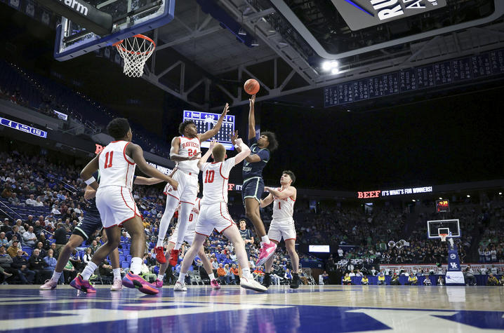 Scenes from a basketball game. 