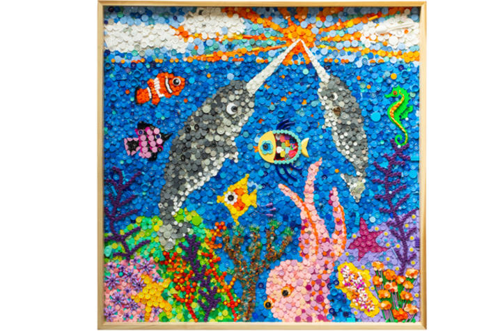 Wide shot of art piece featuring sea creatures made from plastic