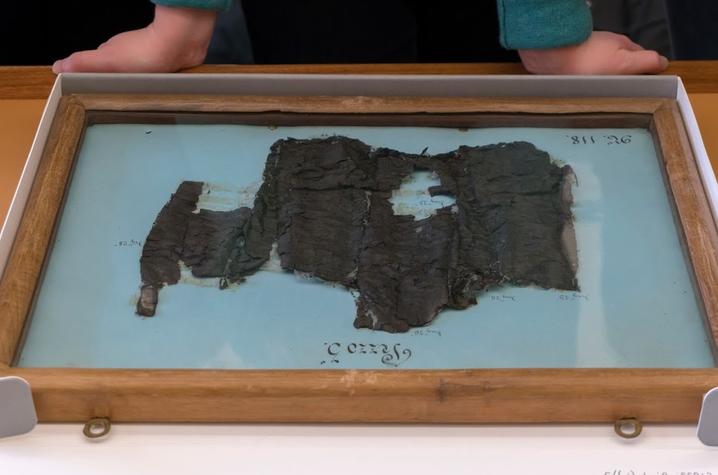 photo of a carbonized fragment of a scroll