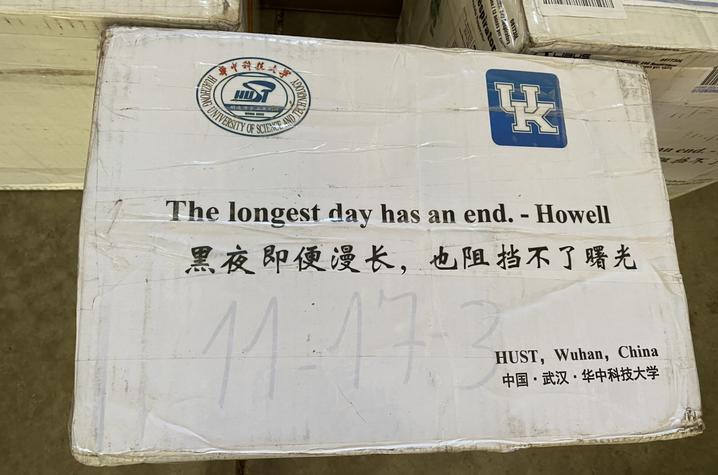 photo of box of PPE from China with the message "The longest day has an end."