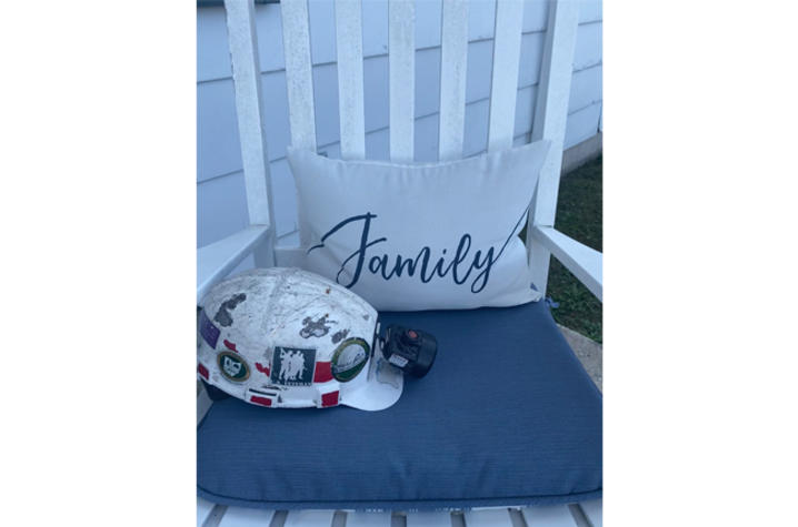 Image of hard hat in rocking chair