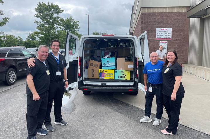 UK's pharmacy team with a van load of donations from Costco. The pharmacy team has been in Eastern Kentucky providing tetanus and Hepatitis A immunizations.