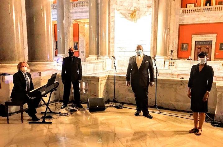 photo of masked Tedrin Blair Lindsay, Whit Whitaker, Everett McCorvey and Dione Johnson Napier in Capitol for Phyllis George Memorial