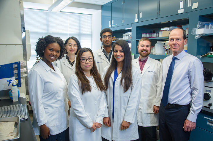 UK Superfund Research Center director Bernhard Hennig (right) with doctoral students who are part of the center’s “Project #1,” which examines how nutrients affect toxicity caused by PCBs in vascular tissues.