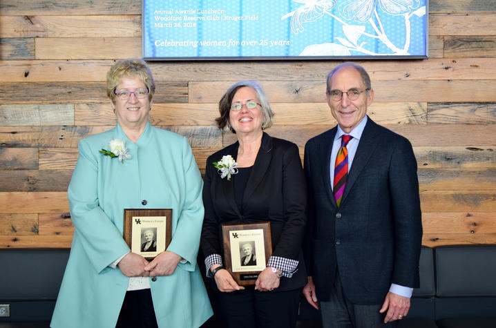 photo of Sarah Bennett Holmes Award winners Debra Moser and Lisa Collins with UK President Eli Capilouto.