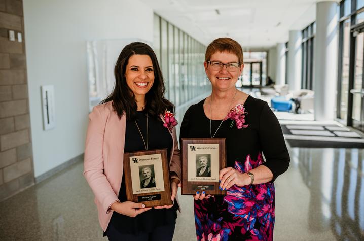 Last year's Sarah Bennett Holmes Award winners were staff recipient Micaha Hughes, left, and faculty recipient Janet Lumpp, both from the College of Engineering. Photo by Sarah Caton.