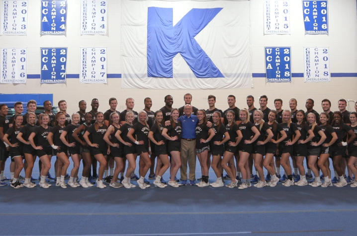 This is a photo of the UK Cheerleading Squad, with T. Lynn Williamson in the middle.