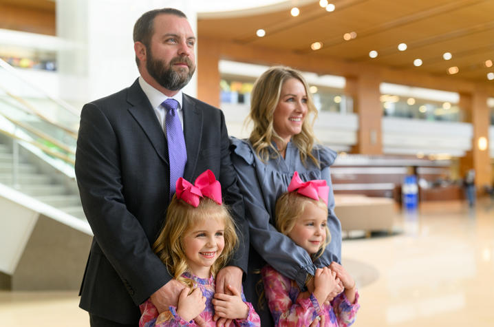 Photo of twins with their parents