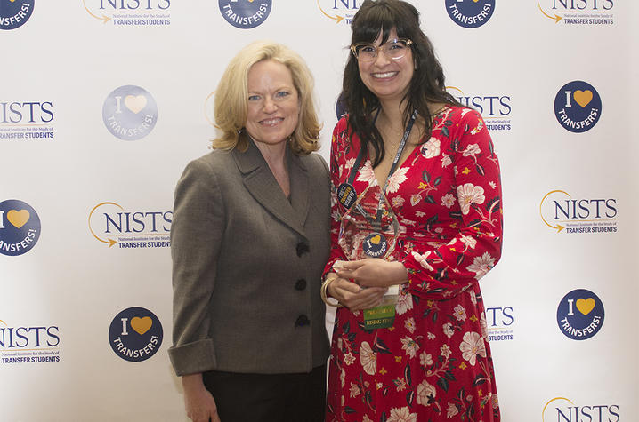 Dr. Janet Marling on left and Sara Price on right holding award