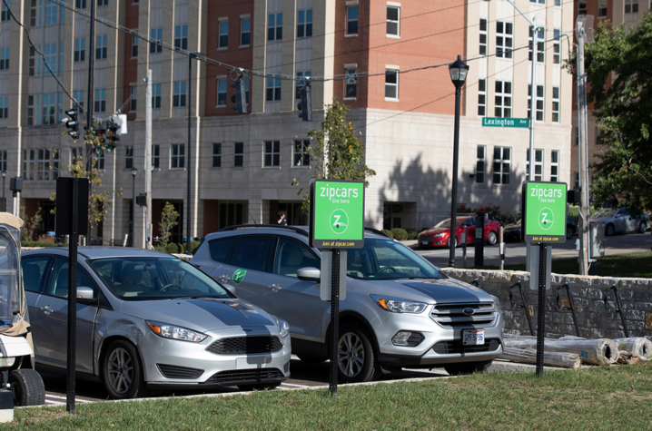 Cars parked on campus. 