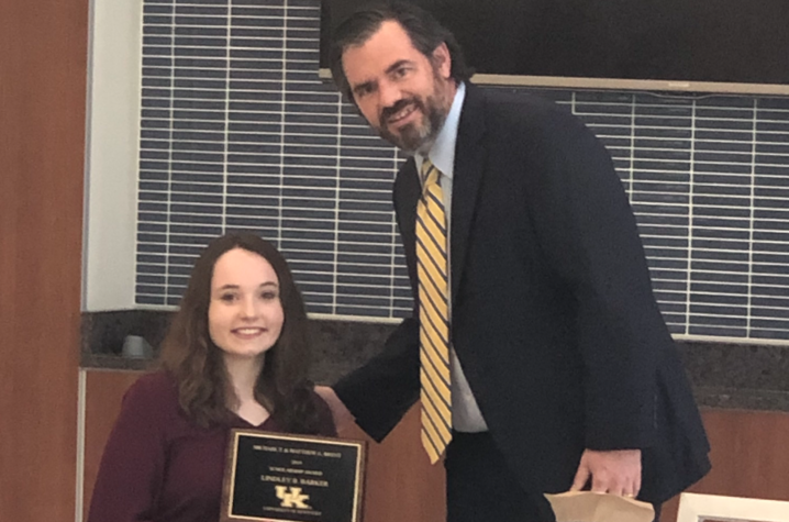 Lindley Barker accepting the Brent Scholarship  at the 2019 DRC recognition ceremony. 