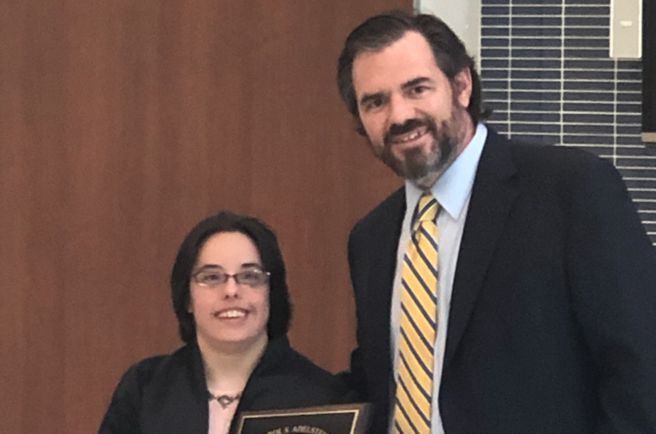 Megan McCormick (left) receiving the Adelstein Award during the DRC's annual recognition ceremony. 