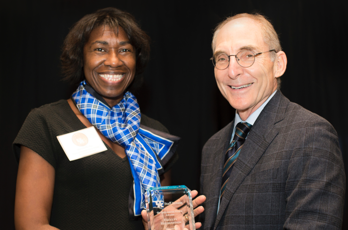 photo of President Capilouto and award winner Sharon Hodge of Social Work