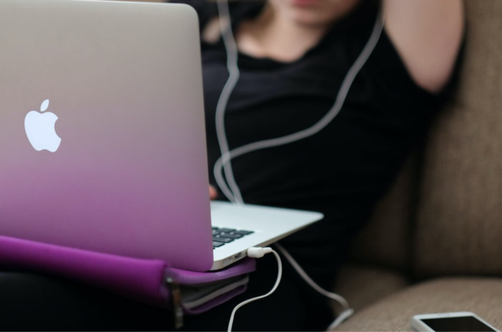 Girl sitting with a laptop