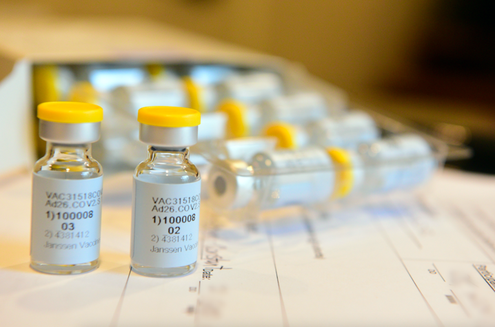 Vials of the Janssen/Johnson & Johnson COVID-19 vaccine candidate sit on a table. 