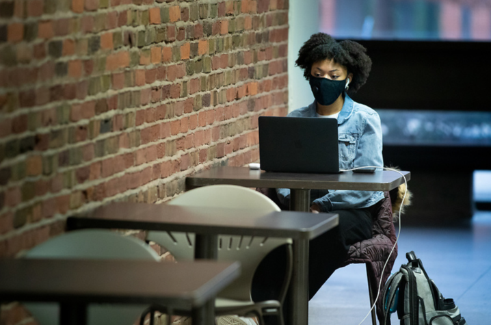 Girl working on her laptop.