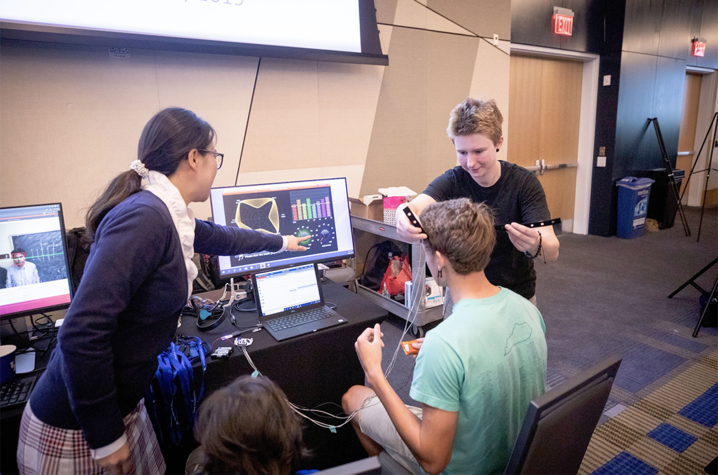 Student seated in front of computer