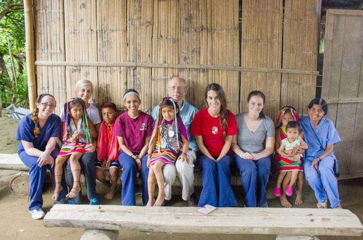 Dr. Thomas Young and Dr. Nirmala S. Desai with students and patients