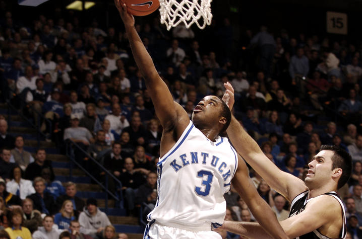Brandon Stockton playing basketball.