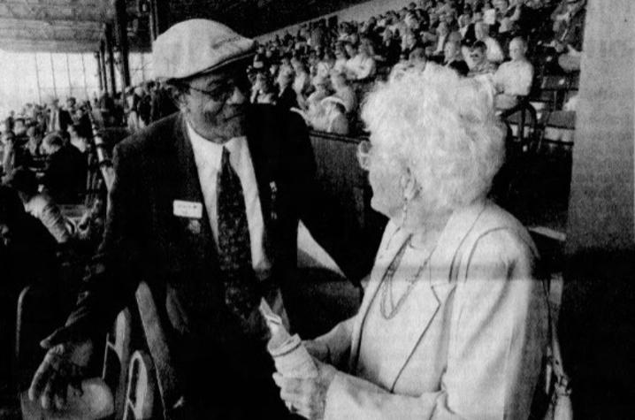 Robert Stoudemire talks with Keeneland patron Joan Jaber