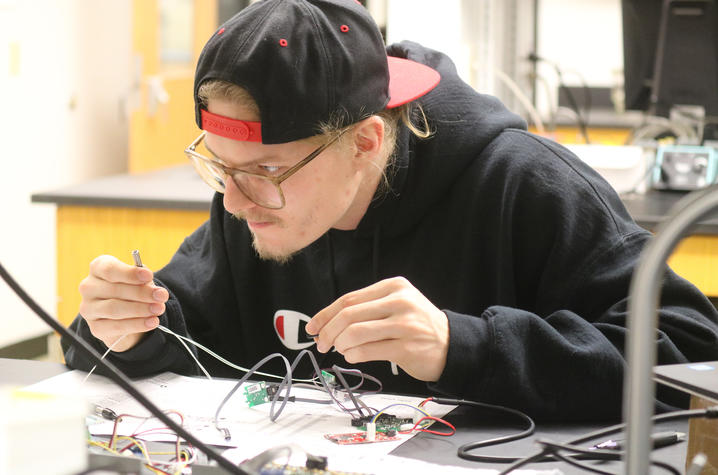 photo of Travis (TJ) Schuyler in lab