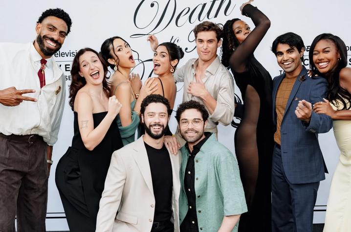 Group of people posing together in front of a step-and-repeat backdrop featuring Disney Television Discovers Talent Showcase branding and event signage.