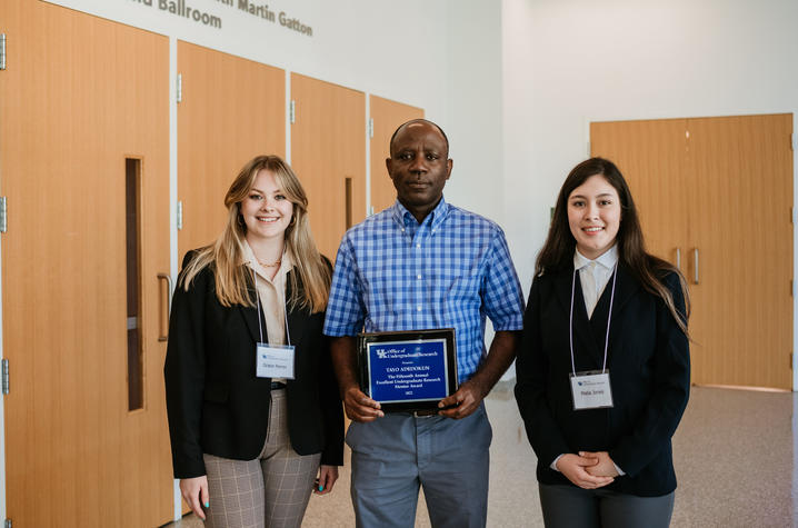 2022 Excellent Undergraduate Research Mentor Award winner Tayo Adedokun with students Grace Perrin and Malia Jones.