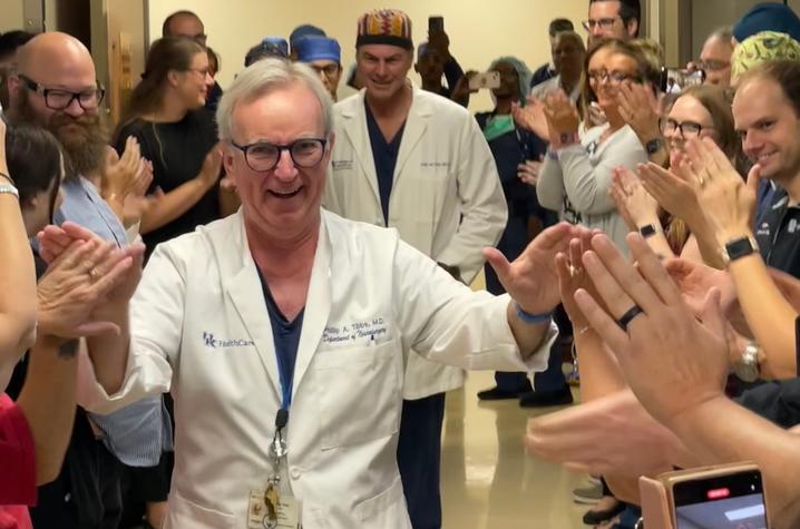 Tibbs walked out of the operating room for the final time on June 21, 2023, to applause from his fellow neurosurgeons and staff at UK. Photo by David Dornbos