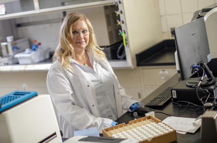 photo of Tiffany Messer standing in lab