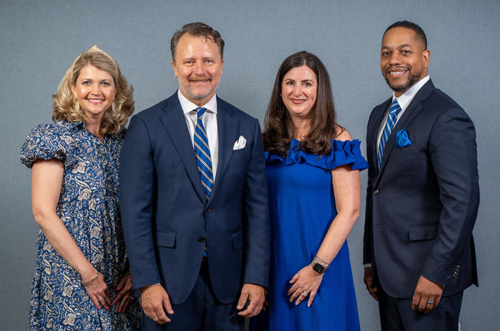 The 2025-26 UK Alumni Association officers are, from left, Jill H. Smith, secretary; Thomas K. Mathews, president; Kelly Sullivan Holland, president-elect; and Quentin R. Tyler, treasurer. Photo by Scott Hayes.