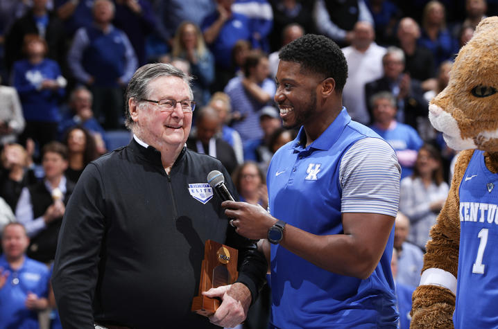 Photo of Coach Joe B. Hall interviewed by Ravi Moss - 40th anniversary of 1978 team