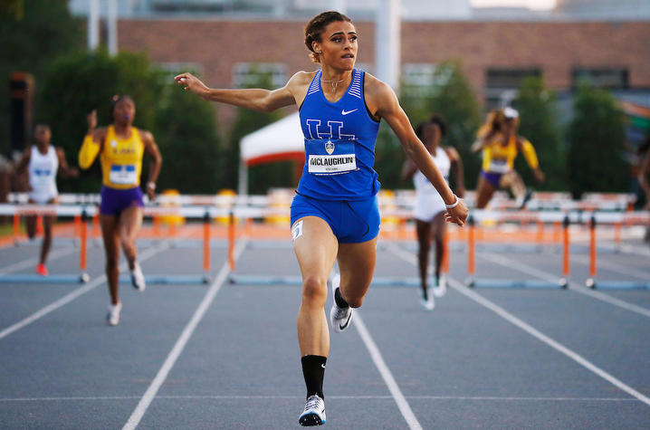 photo of Sydney McLaughlin running hurdles for UK in SEC competition