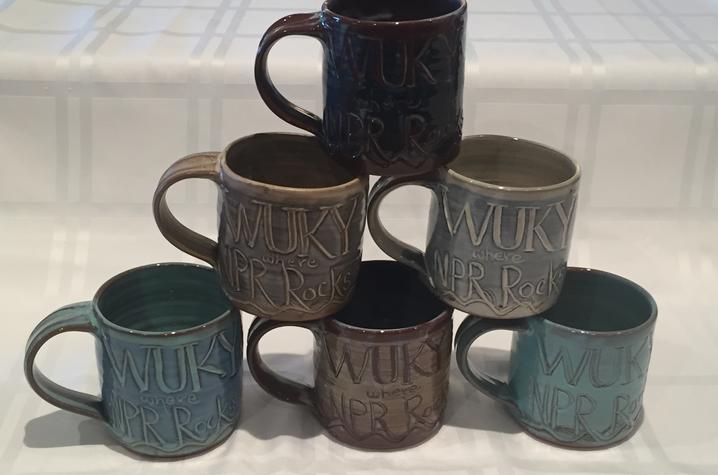 photo of mugs that say "WUKY where NPR Rocks"