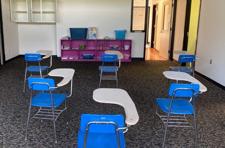 Photo of desks physically distanced in the Y Academy at UK