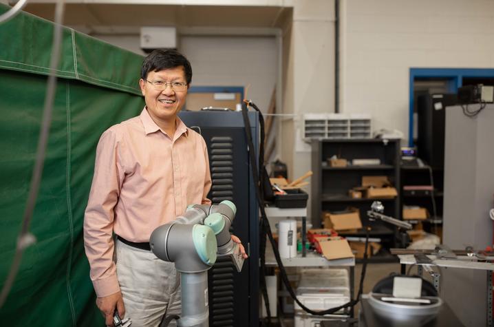 Photo of YuMing Zhang in the Lab