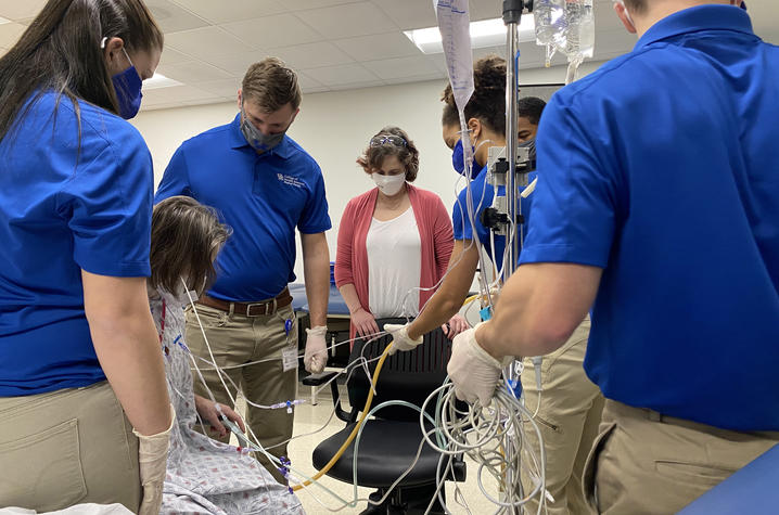 Angie Henning with physical therapy students