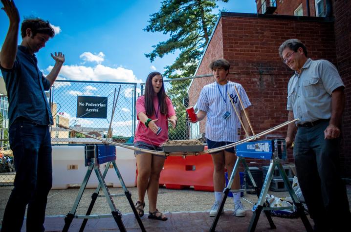 photo of 3 GSA students in Architecture + Design working with Bruce Swetnam