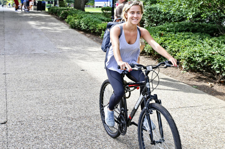 photo of student on bike