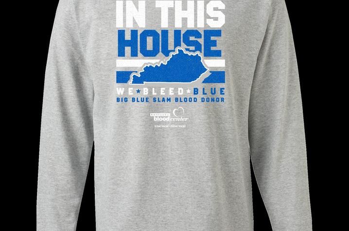photo of Big Blue Slam T-shirt that says In This House, We Bleed Blue. Big Blue Slam Blood Drive.