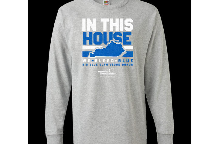 photo of Big Blue Slam T-shirt that says In This House, We Bleed Blue. Big Blue Slam Blood Drive.