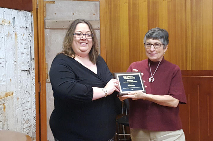 Photo of Janice Birdwhistell from TOPSoccer being honored by the College of Communication and Information.