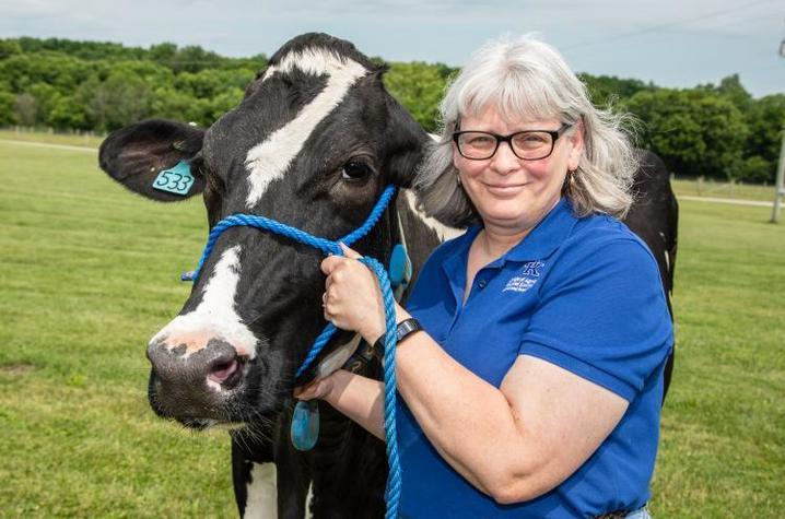 Donna Amaral-Phillips with cow
