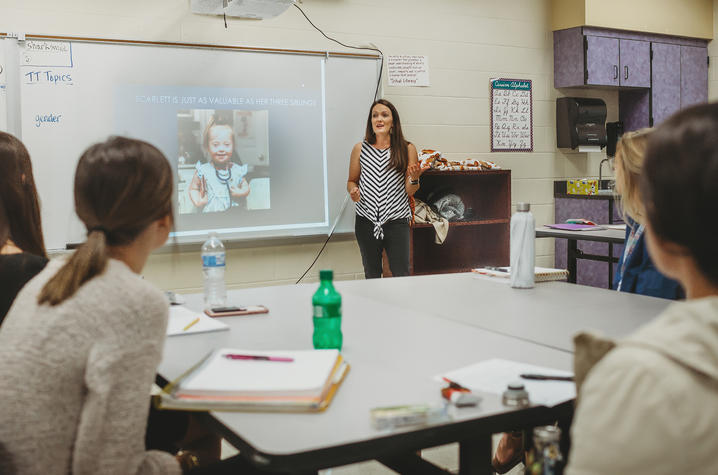 Laura Yost, a former UK cheerleader and UK College of Education alumna, is using her life experiences to help future teachers offer students a welcoming, equitable learning environment.