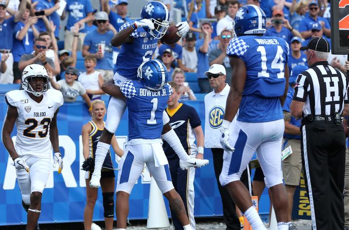 UK football celebrates touchdown over Toledo. UK Athletics | UK Photo.