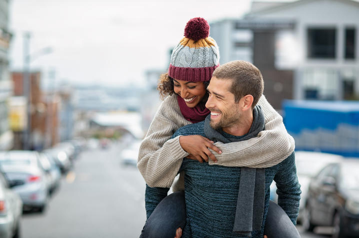 Couple in sweaters and hat